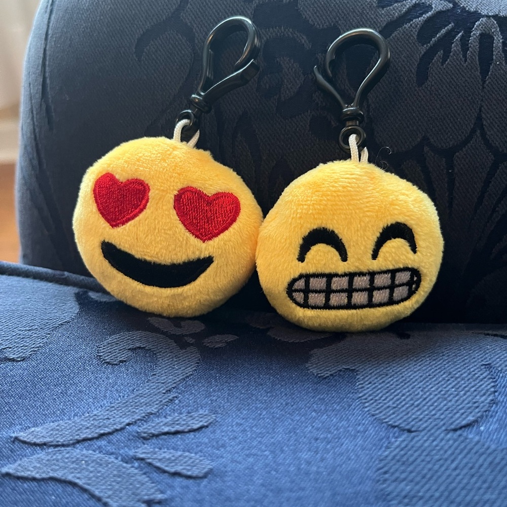 Emoji Face Key Chain Plushie And A Green Frog Plushie